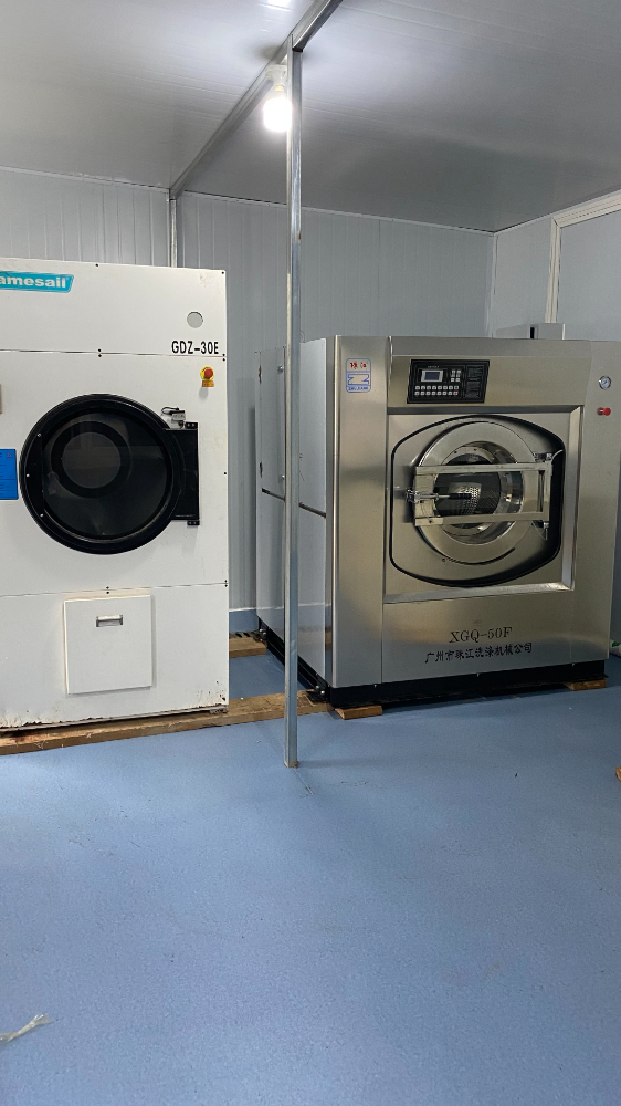 珠江洗滌設備工業(yè)隔離式洗衣機廠案例分析